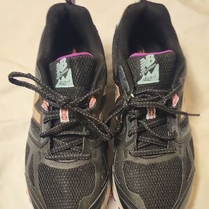 New Balance Women’s Black Running Sneakers with Purple and Mint Accents